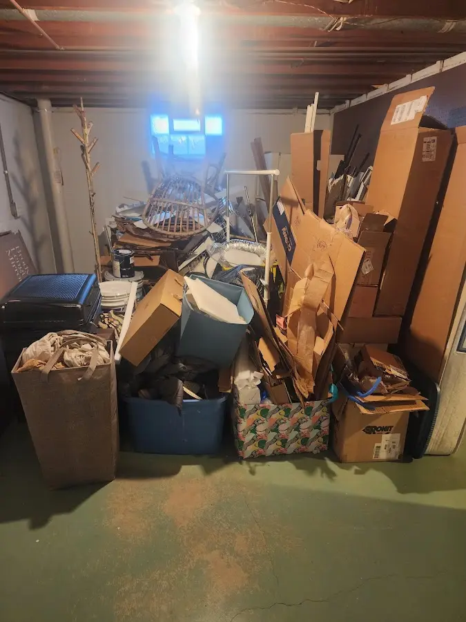 Roll-off dumpster container at job site for Yard Waste Dumpster Rental in Sugar Creek